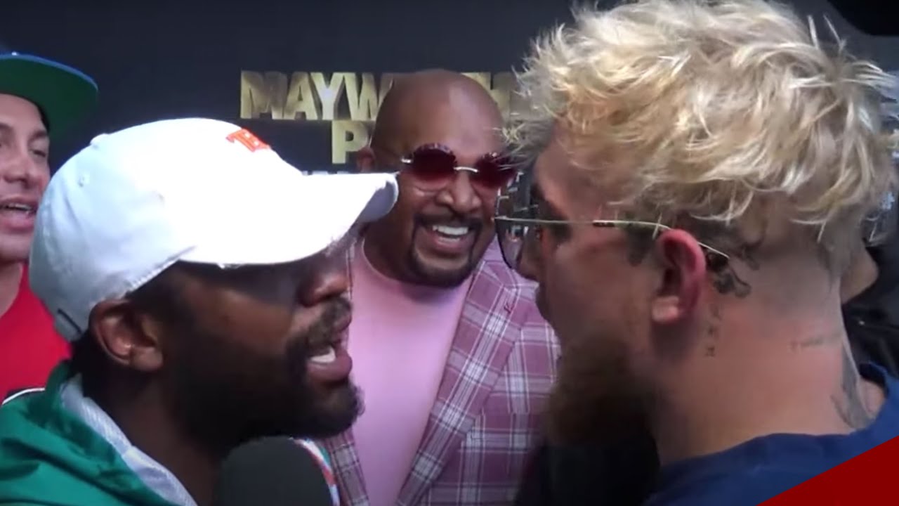 (GOT YOUR HAT) Jake Paul SNATCHES Mayweather's hat.